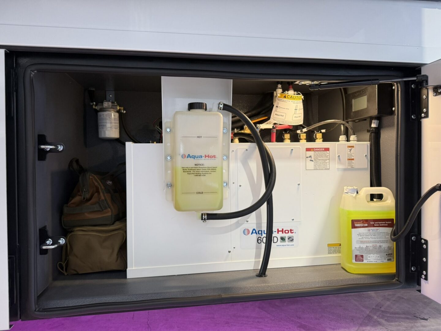 Aqua-Hot heating system in storage compartment.