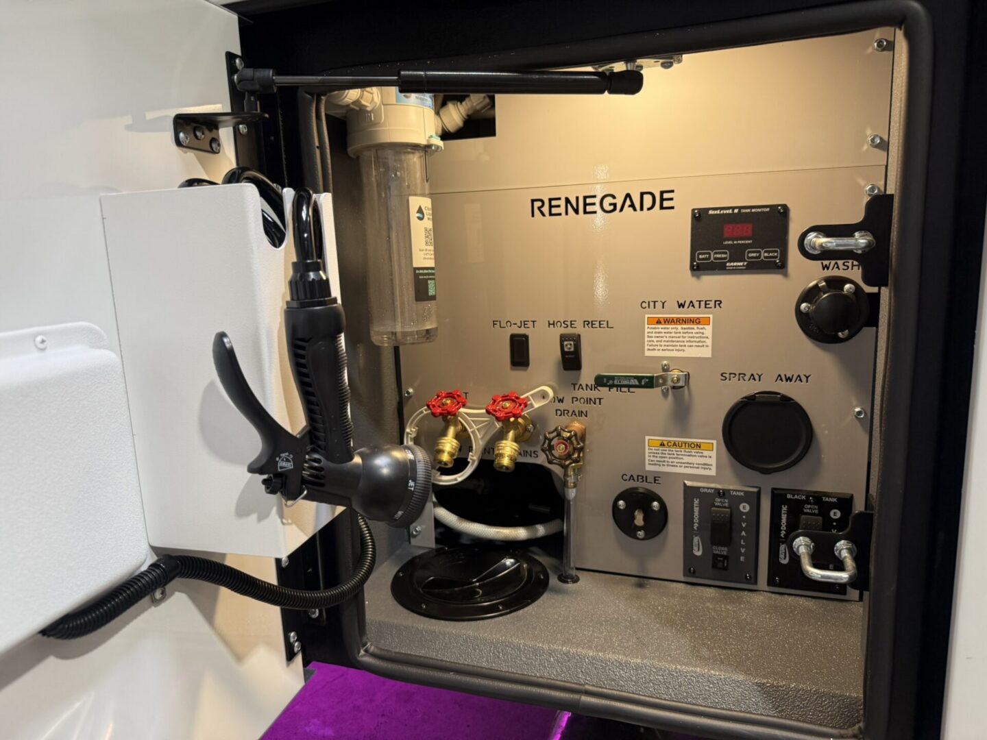 Renegade vehicle utility compartment with controls.