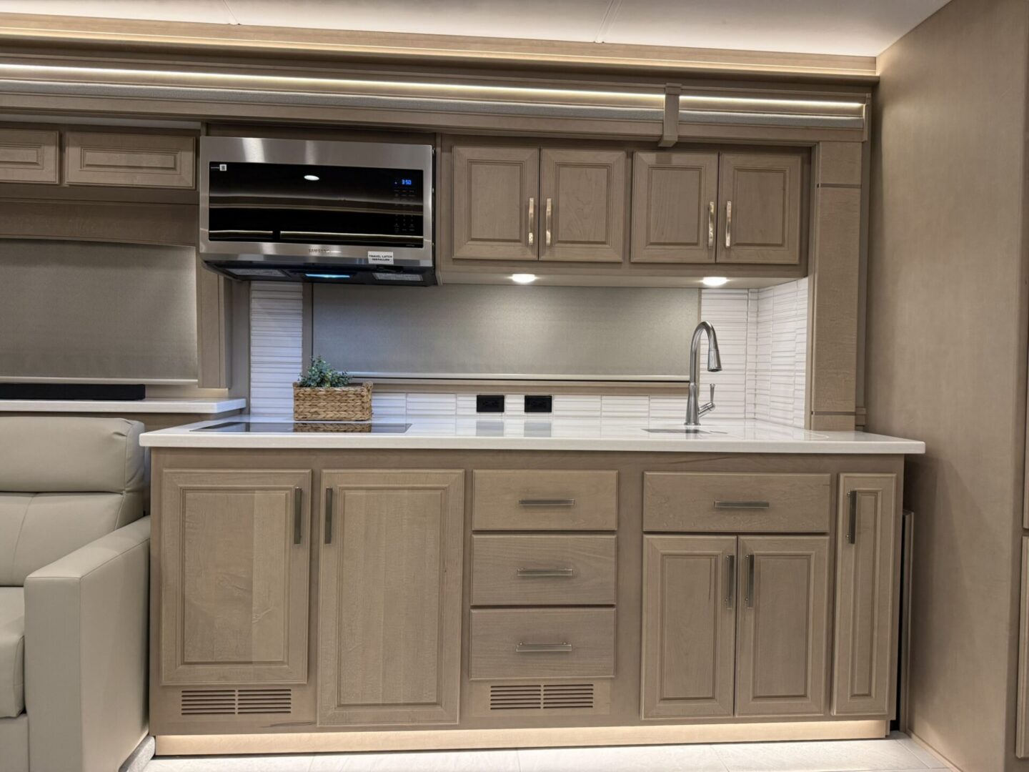 Modern kitchen with sleek cabinetry and appliances.