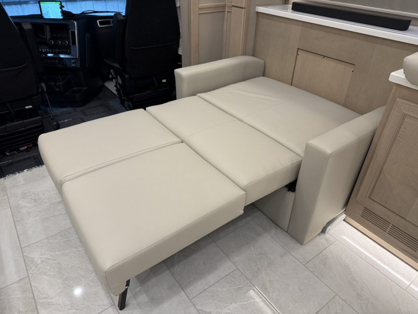 Convertible sofa bed in modern interior.