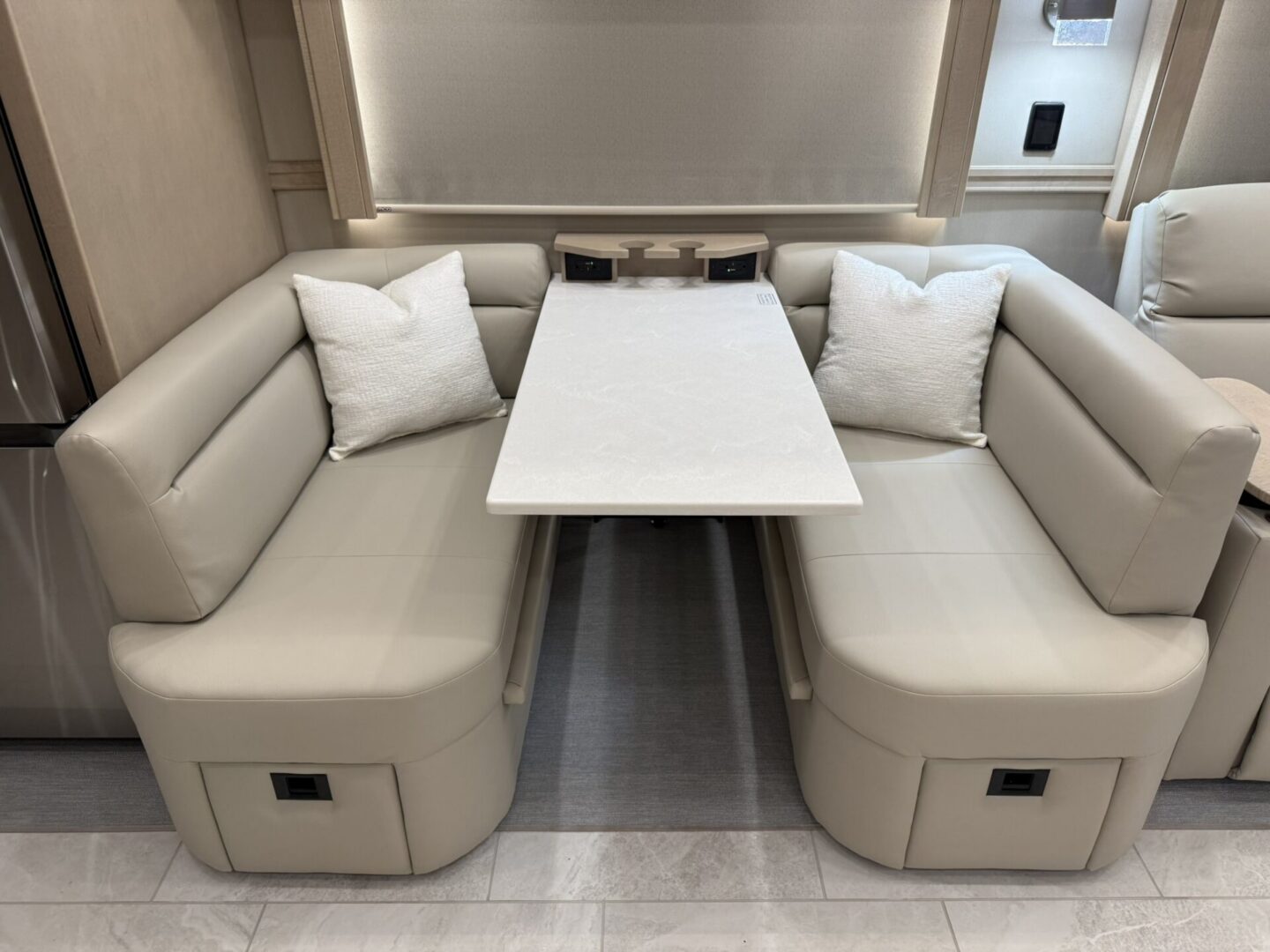 Cozy dining area with cushioned seating.