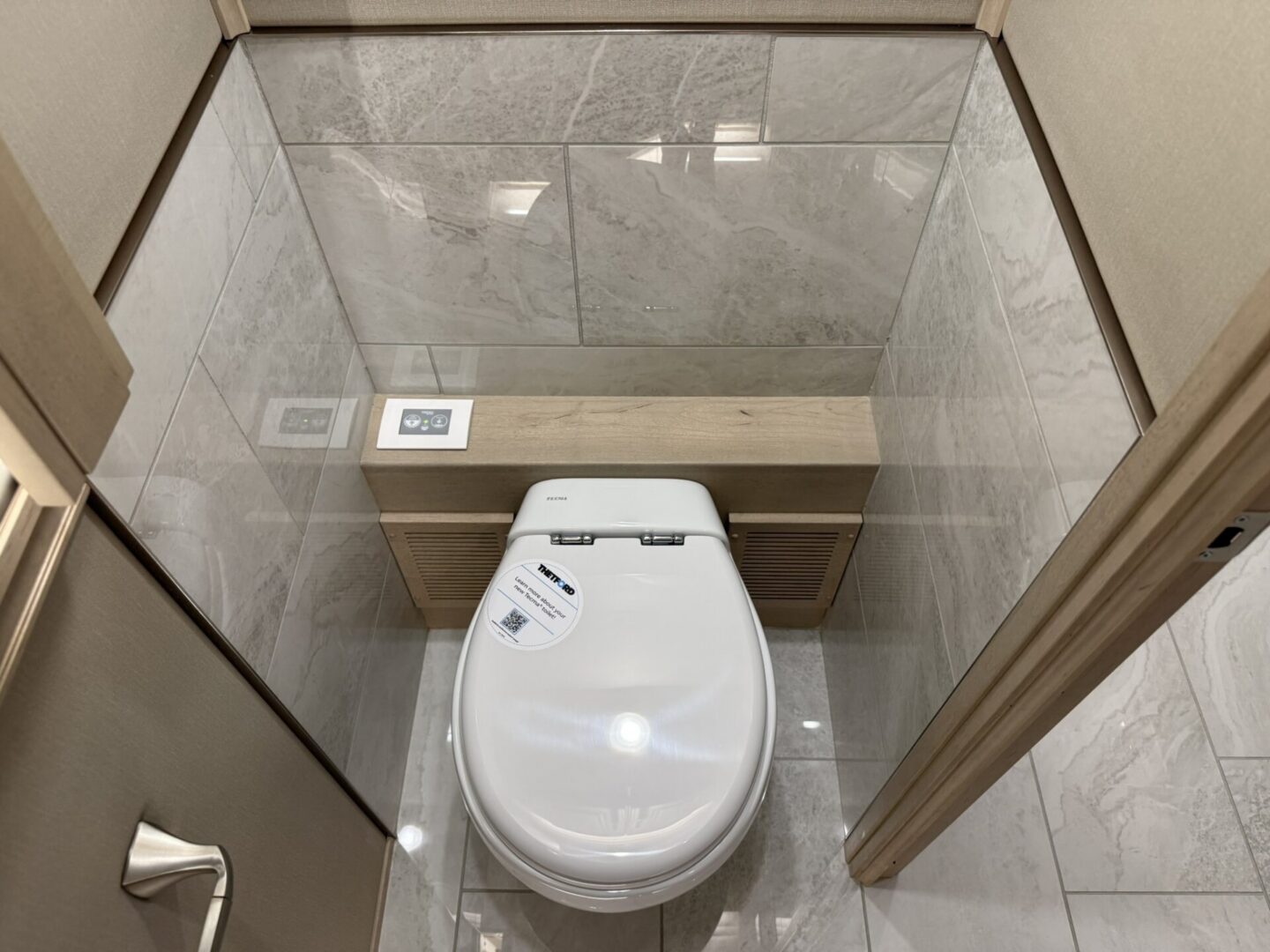 Modern bathroom with a sleek toilet design.