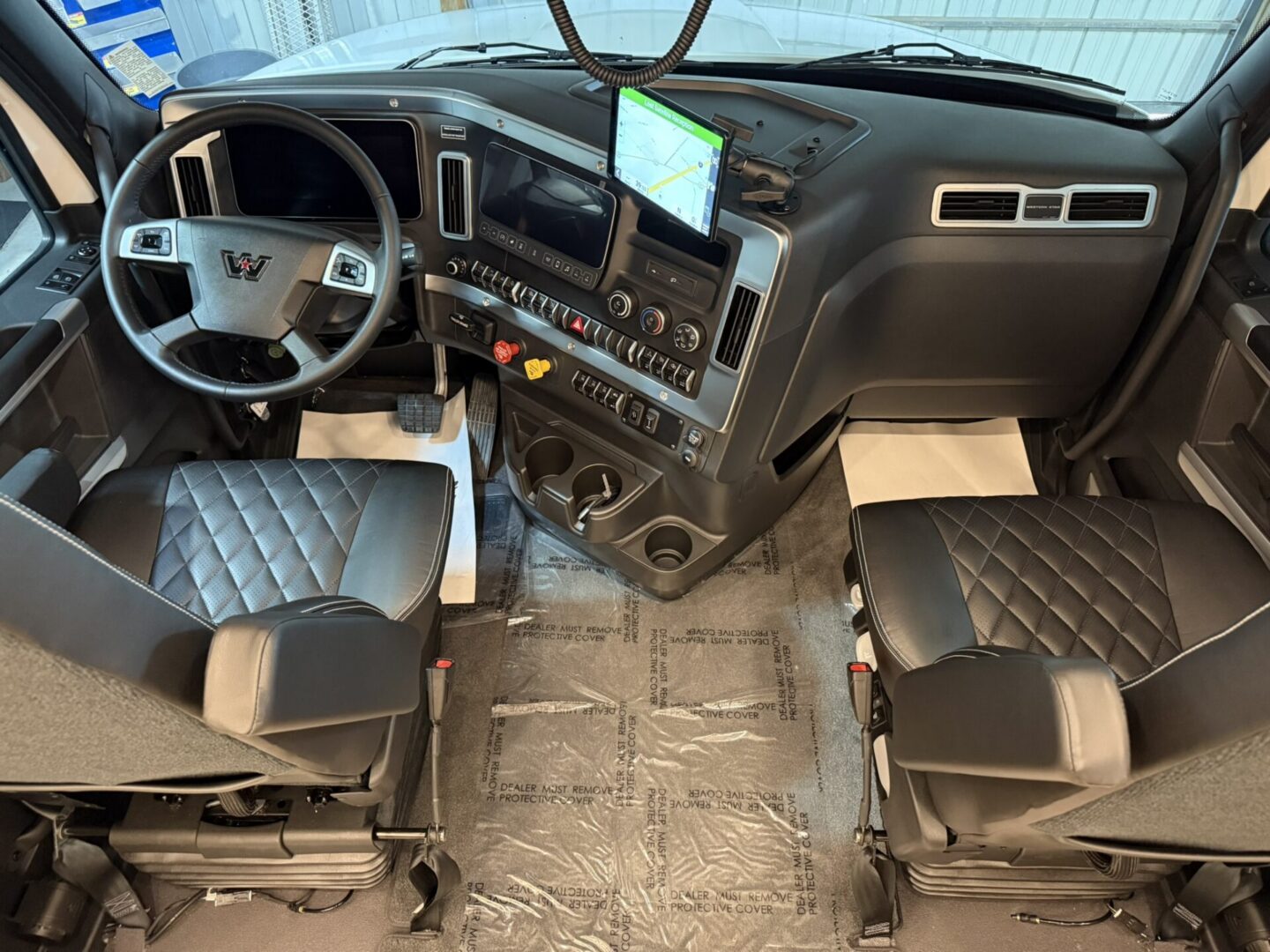 Modern truck interior with leather seats.