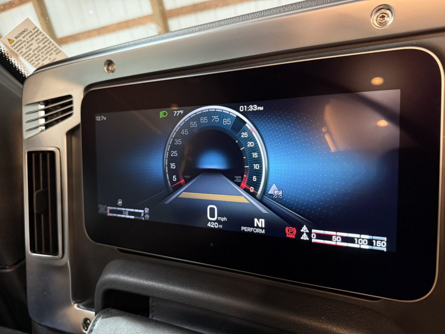 Digital dashboard displaying speed and performance.